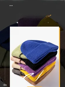Detailed view of assorted colorful ribbed knit beanies in trendy autumn winter shades