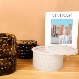 Detailed silicone mold and finished resin storage jars with geometric relief texture