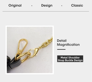 Detailed close-up of golden metal chain strap and lobster clasp on black leather bag