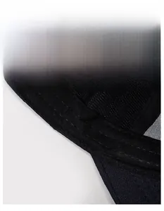 Detail of widened sweatband on a black baseball cap for moisture wicking and breathability