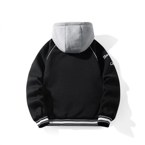 Detail of hooded baseball jacket showing striped rib cuffs and white script sleeve print