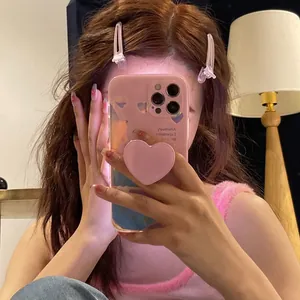 Pink heart phone grip with matching case and matte hair clip set for women