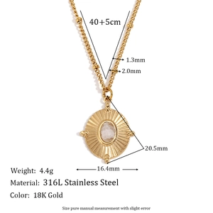 18K gold plated stainless steel sunburst necklace with oval white crystal pendant