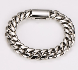 Detailed view of silver stainless steel Cuban chain link bracelet with secure box clasp