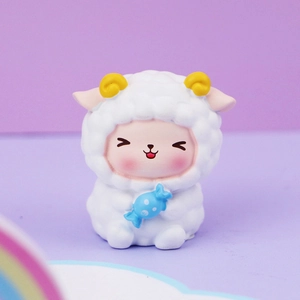 Cute cartoon lamb girl figurine holding blue candy for car interior and desk decor