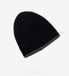 Detail of soft fleece lining inside the black knitted beanie for winter warmth