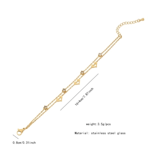 Detailaufnahme des doppelten goldenen Herzarmbands mit Größenangabe 16+4cm