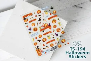 Detailed close-up of 5D Halloween nail stickers with pumpkins and ghost designs