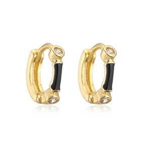 Detailed shot of 18K gold plated hoop earrings with black enamel and sparkling zircons