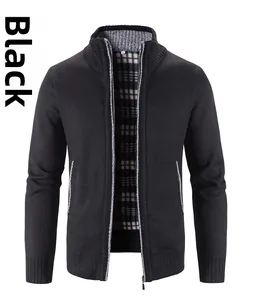 Detail of men's black knit cardigan featuring warm plaid lining and ribbed collar trim