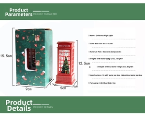 Christmas telephone booth night light detail showing red frame and decorated tree