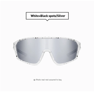 Macro shot of white frame with black spots and silver mirrored sports sunglasses lens