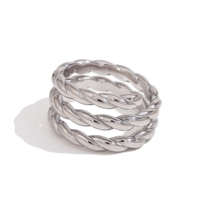 Minimalist silver triple-layer spiral twisted open ring in polished stainless steel