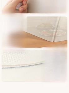 Detail of high-density mesh food cover showing seamless edge and foldable storage design