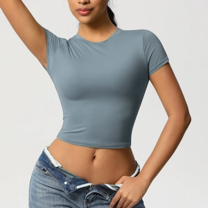 Close-up of slim fit gray-blue yoga crop top with elastic breathable fabric for sports