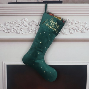Green velvet Christmas stocking with gold Merry Christmas embroidery and star patterns