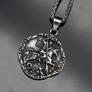 Vintage stainless steel necklace featuring a polished silver knight relief pendant