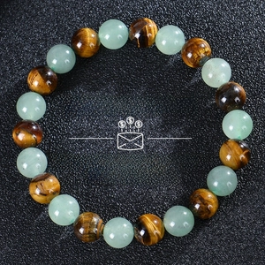 Tiger eye and aventurine beaded bracelet with Money Success text on grey texture