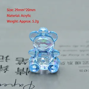 Macro detail of a 29mm blue acrylic bear pendant with faceted gemstone cut and top loop