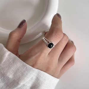 Minimalist 925 sterling silver open ring with vintage black onyx gemstone on hand