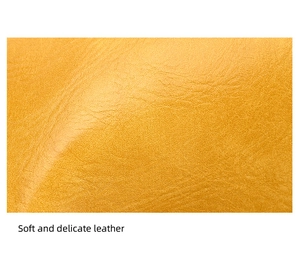 Close-up of soft and delicate yellow leather texture with premium grain detail