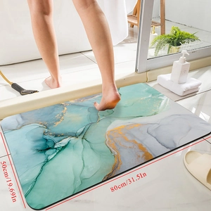 Dettaglio tappeto bagno in diatomite marmorizzata con dimensioni 50x80cm e oro