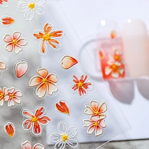 3D floral nail art stickers with orange and white flowers on transparent adhesive film