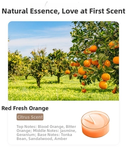 Detail view of orange scented tea light candle with Red Fresh Orange fragrance notes