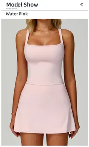 Detailed front view of light pink yoga fitness dress with wide straps and flared hem