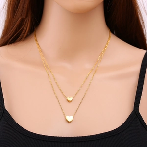 Double-layer gold stainless steel necklace featuring two small heart charms for women