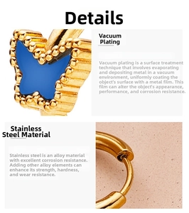 Detail of gold butterfly earring with blue enamel and vacuum plated stainless steel