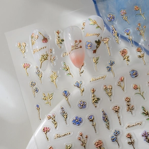 3D embossed floral nail stickers with gold outlines and colorful rose designs