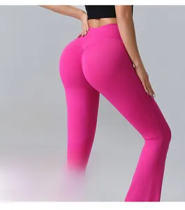 Detail of high waist flared yoga pants with scrunch butt lifting seam in rose pink