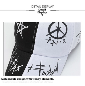 Close-up of black and white baseball cap with street style FASHION and star printing