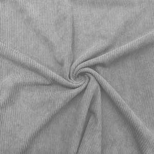 Close-up of grey corduroy polo shirt fabric showing soft vertical ribbed texture