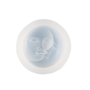 Detailed macro view of moon and sun face silicone mold for DIY aromatherapy candles