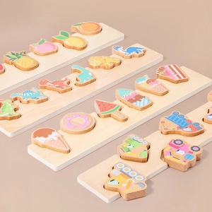 Educational wooden shape matching puzzle set for toddlers featuring colorful patterns