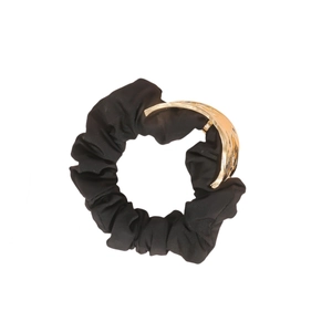 Elegant black pleated scrunchie with a gold metal clasp for modern women's hair styling