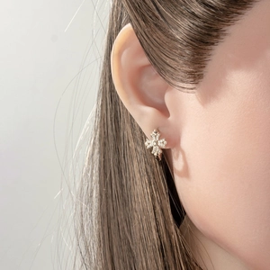 Elegant gold cross hoop earrings with sparkling diamonds for a vintage fashion style