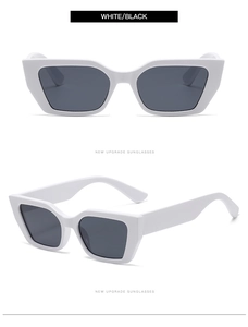 Details der weißen rechteckigen Sonnenbrille mit breiten Bügeln und dunklen Gläsern
