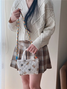 Quilted mini crossbody bag with cute bear print and colorful woven rope shoulder strap