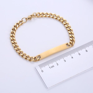 Polished gold stainless steel cuban link bracelet with blank engraving bar and length scale