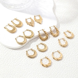 Minimalist irregular gold stainless steel hoop earrings set with textured patterns