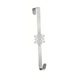Creative metal Christmas wreath door hanger with delicate hollowed-out snowflake design