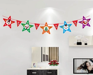 Detail of colorful star and triangle banners with Santa and Merry Christmas text