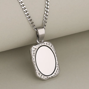 Polished silver stainless steel rectangular pendant necklace with hammered texture edge