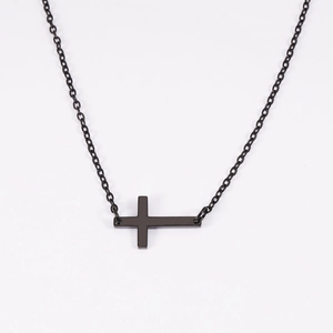 Polished black stainless steel horizontal cross necklace on a thin chain over white background
