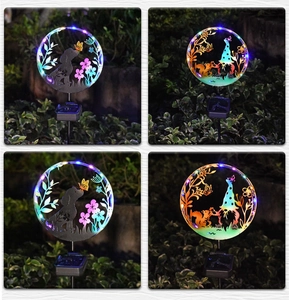 Solar garden lights with four metal cutout patterns and colorful LED silhouettes