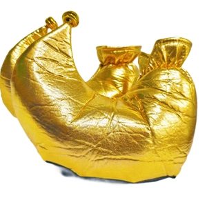 Detail of metallic gold clown costume shoes with traditional curly toe and bell shape