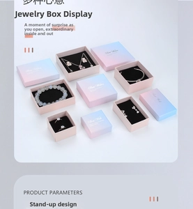Detailed view of assorted gradient jewelry boxes featuring Best Wishes gold foil stamping